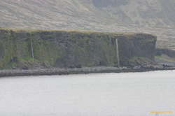 Water running of the coastal plain into the sea, near Arnarstapi