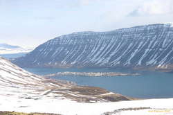 A tiny town hanging out in the middle of the fjord.
