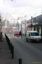 Tv journo runs off down the street
