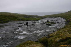 Crossing a stream above Hrollaugsvík
