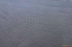 Sand patterns on the beach at Bolungarvík