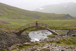 Karl on the bridge over SkorarÃ¡

