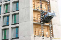 Funky construction ladders on the funky rainbow glass building
