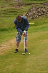 Elmar lines up a long putt
