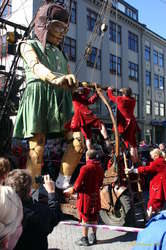 The lilliputians have a scooter for her to ride
