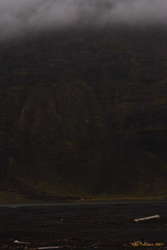 There's a car at the foot of that cliff
