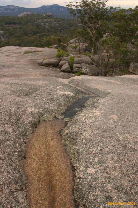 Follow the water downhill
