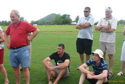 The men listen carefully
