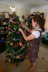 Helen decorating the tree
