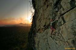 Ash climbing at Slider, Twins in the sunset behind
