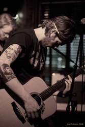 Smokes, tats, gitars
