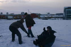 Karl and Lee pull Ute and Alda in sled races
