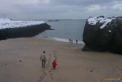 Kids playing on the beach

