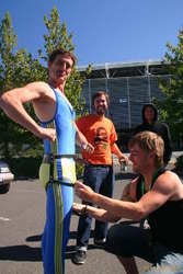Lee gets strapped in by Arni
