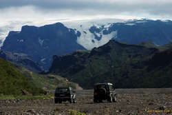 Jeeps loitering on the banks of Krossá
