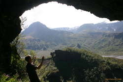 Sverrir in a cave way up the valley side
