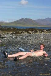 Karl wallowing in a hot puddle
