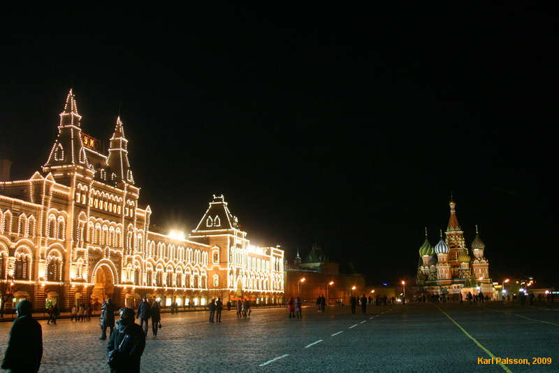 GUM and St Basils lit up at night
