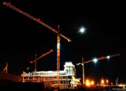 The moon over the half built opera house
