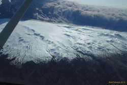 The clouds do a wonderful job of sticking to the summit ridge, and staying on the east