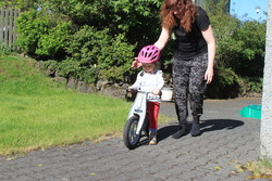 Riding her bike